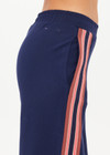 THE UPSIDE women's navy Ananda Wide Leg Cody Pant is a true-to-size fit and features an elasticated waistband, side pockets and knitted stripes down sleeves. The perfect everyday piece.
