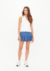 THE UPSIDE women’s white Henri Collared Top, in a cotton pique fabrication, features buttons at the front neck with a ribbed collar in a navy stripe. Designed for tennis.