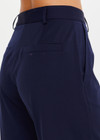 THE UPSIDE women’s navy Mira Wide Leg Pant is high-waisted made from quick-dry fabric, with a structured waistband and fly zip closure. Perfect for everyday.