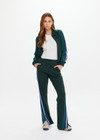 THE UPSIDE women’s green Lenzing viscose Maneki Petra Flare features hem splits and contrast knitted tape down the side seams. Made for lifestyle.