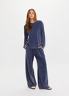 THE UPSIDE women's blue recycled cotton Soho Mali Long Sleeve Top has a relaxed fit and ribbed neckline in a sustainable, soft brushed fabric. Made for lifestyle.