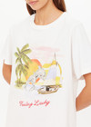 THE UPSIDE women's organic cotton creme Feeling Lucky Jodhi Tee features a classic shape and Feeling Lucky graphic printed on the front chest. Made for everyday wear.