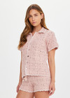 THE UPSIDE women's pink organic cotton Anoki Lovett Crochet Shirt has a relaxed fit with cream scalloped edges and pink pearlised shell buttons. Perfect for travel or everyday.