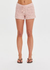 THE UPSIDE women's pink organic cotton Anoki Malik Crochet Short features an elastic waist with tassel braided drawcord and cream scalloped edge detailing. Perfect for travel or everyday.