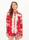 THE UPSIDE women's red Palma Bobbi Collared Shirt features sleeve plackets, pearlised buttons, and cream crochet lace panels. Perfect for travel or lifestyle.