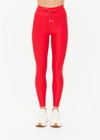 THE UPSIDE women's red eco tech Oxford 25-inch Legging is supportive and comfortable with cream side stripes and an elastic waist drawcord. Made for high impact.
