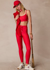 THE UPSIDE women's red eco tech Oxford 25-inch Legging is supportive and comfortable with cream side stripes and an elastic waist drawcord. Made for high impact.