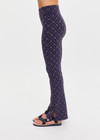 THE UPSIDE women's monogram jacquard Ezra Florence Flare is high-rise with a firm & supportive fit, featuring a V panel waistband and side seam split at hem. Made for yoga and pilates.