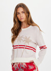 THE UPSIDE women's creme organic cotton Palma Joni Knit Crew features raglan sleeves, palm tree chest design, and red stripes around back and sleeves. Made for lifestyle.