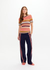 THE UPSIDE women’s stripe Sutton Knit Tee is designed for a slim fit and and features a semi-sheer striped design with a navy contrast neckline. Made for everyday wear.