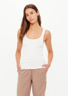 THE UPSIDE women’s white Alyssa Racerback Tank Top features rib fabric, a scoop neck, and embroidered 4-leaf clover at the back. Made for everyday leisure.