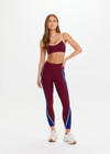 THE UPSIDE women’s maroon Adesa Scoop Danni Bra in recycled rib features scoop front and back necklines, removable cups, and soft elastic underbust. Made for high impact.