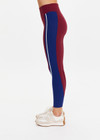 THE UPSIDE women’s maroon Adesa 25In High Midi Pant in recycled rib features a V-panel waistband and moisture-wicking properties. Made for high impact.