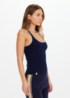 THE UPSIDE women’s navy organic cotton Equine Raf Knit Tank is designed for a slim fit and features a racerback design with tan stripe detailing along neck and armhole. Made for everyday.