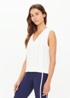 THE UPSIDE women’s cream organic cotton Espada Hermina V Neck Vest is designed for a regular fit and features a chunky cable knit texture. The perfect lifestyle piece.