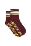 THE UPSIDE women’s maroon Adesa Grip Sock has a midi ankle fit with lemon grip on the sole and cream, yellow, and blue stripes at the ankle. Made for yoga and pilates.