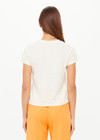THE UPSIDE women's creme organic cotton The 70's Tee features a rib neckline and classic 70s-inspired style. Made for everyday wear.