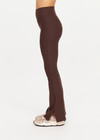 THE UPSIDE women's brown Peached Florence Flare is a high-rise full length flare pant with V waistband and a printed arrow logo on back waistband.