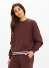 THE UPSIDE women's brown organic cotton Toluca Lisel Crew Neck Sweater offers a relaxed fit with a dropped shoulder and features a ribbed neckline and cuffs. Made for lifestyle.