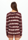 THE UPSIDE women's brown & cream tie dye organic cotton Amana Long Sleeve Knit is designed for a relaxed fit and features a contrast striped neckline in orange. Made for everyday.