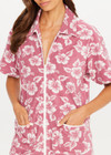 THE UPSIDE women's floral organic cotton Lahaina Cabana Zip Shirt features front patch pockets with zippers. Made for lifestyle.