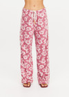 THE UPSIDE women's pink floral organic cotton Lahaina Charli Drawstring Pant has a low-rise straight leg fit with a soft elasticated waistband with drawcord. Perfect for everyday or holiday.