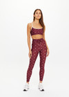 THE UPSIDE women's maroon recycled Bandhani 25-inch midi pant has a soft, supportive fit with elastic drawcord, cream aglets, and mid-rise. Made for yoga and Pilates.