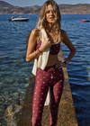 THE UPSIDE women's maroon recycled Bandhani 25-inch midi pant has a soft, supportive fit with elastic drawcord, cream aglets, and mid-rise. Made for yoga and Pilates.
