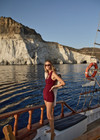 THE UPSIDE women's maroon organic cotton Simi Knitted Playsuit is fitted with a low V-neck and button-up closure with antique brass buttons. Made for lifestyle.