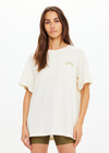 THE UPSIDE women's natural organic cotton Isadora Sammi Tee is designed for an oversized fit and features a printed logo in lime and blue with a soft rib neckline. Made for lifestyle.