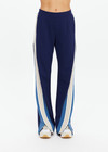 THE UPSIDE women's navy Lenzing viscose Petra Flare is designed for a true-to-size fit and features flare pants with splits and contrast chevron tape down side seams. Made for lifestyle.