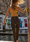 THE UPSIDE women's olive jacquard Castilla Anya Crossback Bra is designed for a soft and comfortable fit and features a high neck crossback bra with removable cups. Made for yoga and pilates.