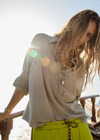 THE UPSIDE women's khaki recycled cotton Soho Rhea Collared Top is designed for a relaxed fit and features a collar at neck with front button opening. Made for lifestyle.