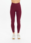 THE UPSIDE women's maroon recycled peached 25 Inch Midi Pant is designed for a soft and supportive fit and features a mid-rise and moisture-wicking. Made for yoga and pilates.