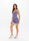 THE UPSIDE women's blue jacquard Neptune Cassandra Bodysuit features a scoop neckline with a low back, removable cups and 3inch shorts. Made for yoga & pilates.