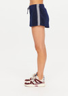 THE UPSIDE women's navy Galaxia Marcella Short is designed for a mid to low rise fit and features elasticated waistband, drawcord with side seam pockets. Made for lifestyle.