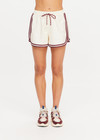 THE UPSIDE women's cream Klio Short is designed for a mid-rise, relaxed fit and features a soft elasticated waistband with drawcord and contrast binds in maroon along curved hem. Made for everyday.