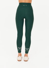 THE UPSIDE women's green recycled soft peached Racquet 25inch Pocket Legging is mid-rise and features side pockets, an elasticated drawcord and mini scallop lce detailing at cuffs. Made for tennis, golf & pickleball.
