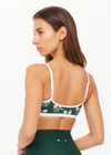 THE UPSIDE women's green Racquet Scoop Danni Bra features a contrast binded scoop neckline, adjustable straps and removable cups with a mini scallop trim at underbust. Made for tennis, golf & pickleball.
