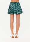 THE UPSIDE women's green Racquet Cadiz Pleated Skirt features built-in shorts with pockets and two tone drawcord with silver tennis racket charms. Made for tennis, golf & pickleball.