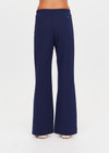 THE UPSIDE women's navy Toledo Petra Flare Pant features tan knitted tape down sides, an elasticated waistband, side pockets and splits at hem. Made for everyday wear.