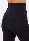 THE UPSIDE women's black recycled jacquard Castilla 25inch Legging is high-rise with a V panel waistband. Made for yoga & pilates.