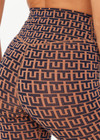 THE UPSIDE women's navy & camel recycled jacquard Castilla 25inch Legging is high-rise with a V panel waistband. Made for yoga & pilates.