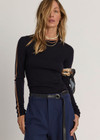 THE UPSIDE women's black Merino Wool Long Sleeve Top is designed for a slim fit and features a crew neck with mocha stripe down sleeve. Made for lifestyle.