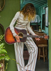 THE UPSIDE women's mocha stripe Baja Charli Drawstring Pant is designed for a low rise, straight leg fit with a elastic waistband with drawcord. Made for lifestyle.