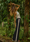 THE UPSIDE women's black Freya Knit Pant has a straight leg fit and features an elasticated waistband  and short splits at hem. Made for lifestyle.