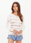 THE UPSIDE women's organic cotton rib Ayla Chrissy Long Sleeve Top is designed for a slim fit and features a brown hand tie dye design on a cream base. Made for lifestyle.