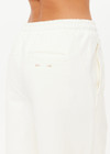 THE UPSIDE women's cream organic cotton terry Arkana Estelle Pant is designed for a relaxed fit with a barrel shaped leg and features an elasticated waistband and side pockets. Made for lifestyle.