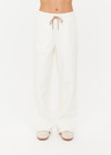 THE UPSIDE women's cream organic cotton terry Arkana Estelle Pant is designed for a relaxed fit with a barrel shaped leg and features an elasticated waistband and side pockets. Made for lifestyle.