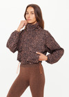 THE UPSIDE women's leopard recycled Ludlow Ace Shell Jacket offers a water resistant, cropped design with front pocket, elasticated cuffs and an orange drawcord at waist. Made for running.